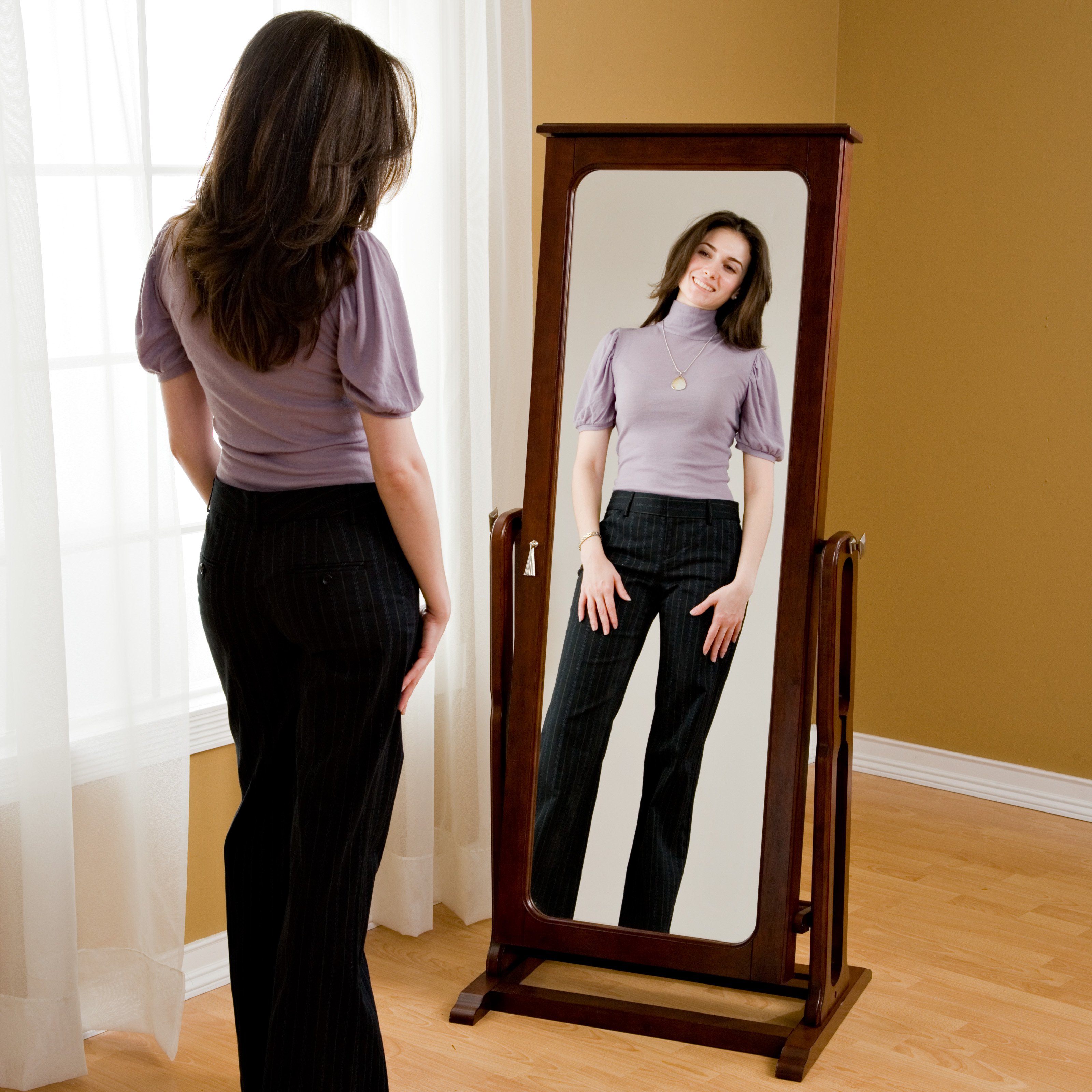 Top 99+ Images woman looking in full length mirror Completed